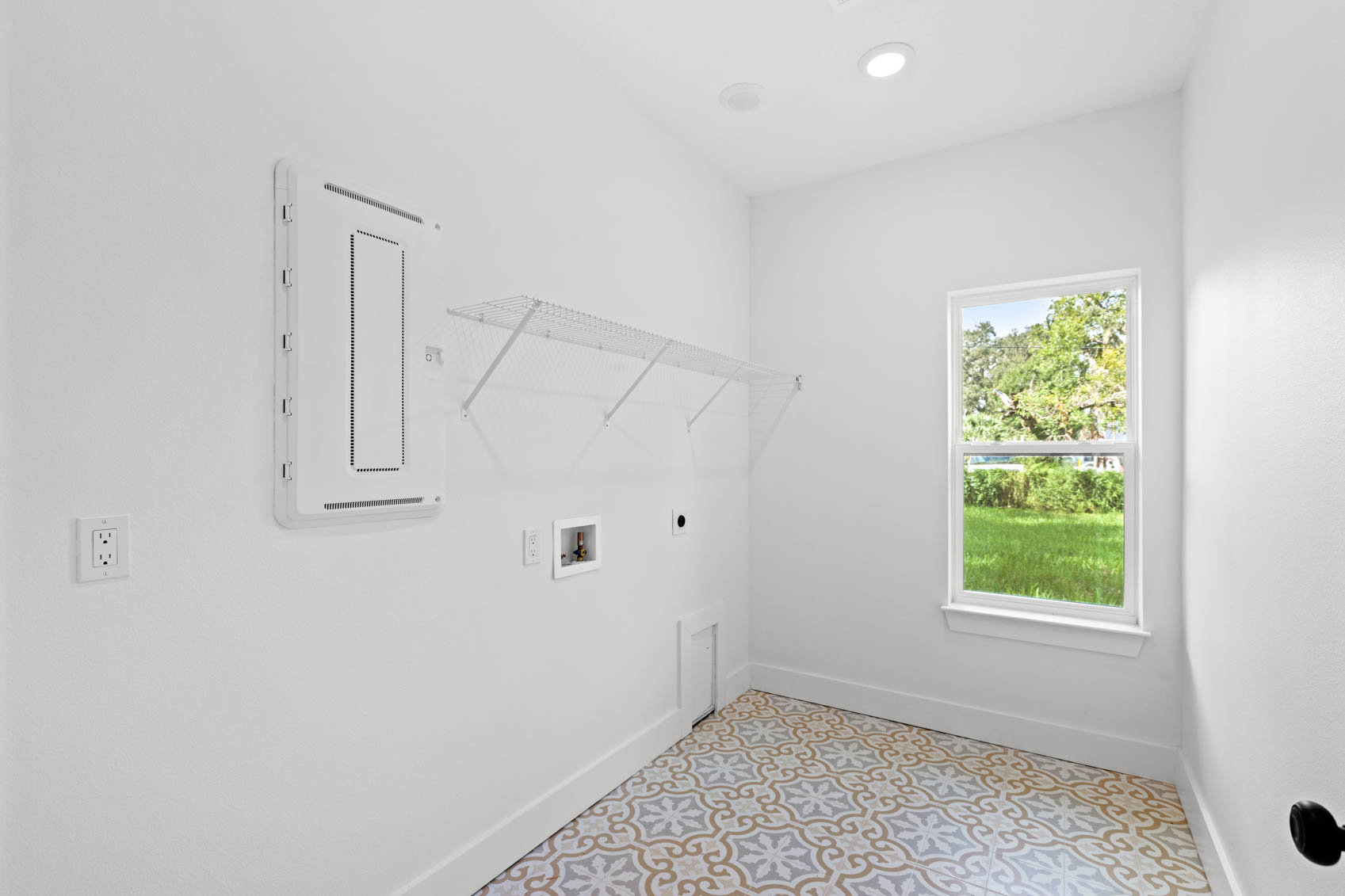 laundry room with patterned floors